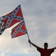 The banning of Confederate flags from NASCAR events shouldn’t be applauded as it should have been long ago, says Carron J. Phillips.